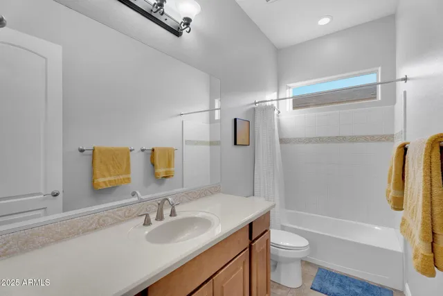 a backyard of a house with outdoor seating