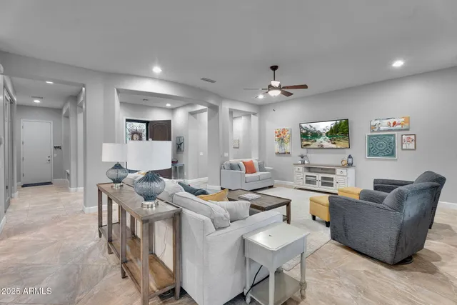 a large kitchen with kitchen island a large counter top