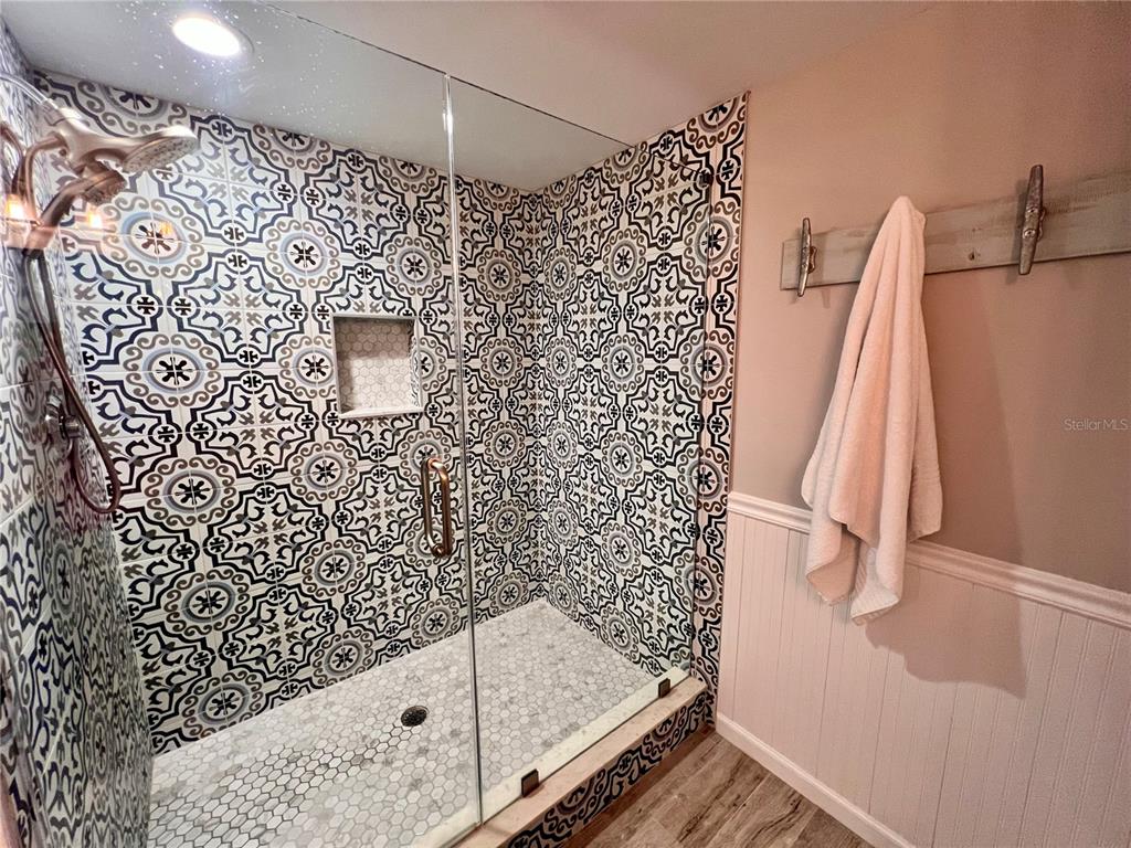 4565 South Atlantic Avenue, Unit 5203 Ponce Inlet, FL 32127 - Photo 26 of 28 a bathroom with a shower