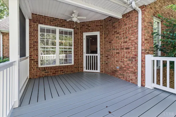 a view of outdoor space with wooden floor