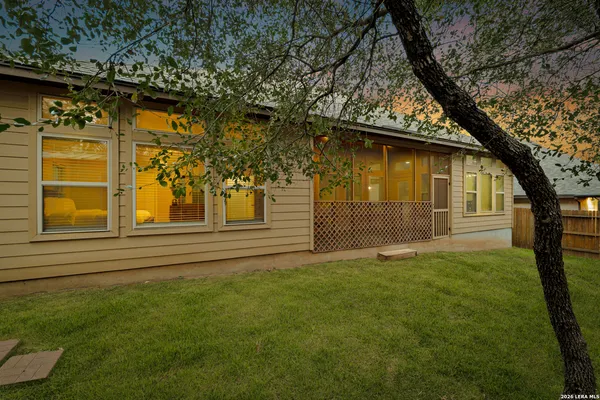 a backyard of a house with lots of green space