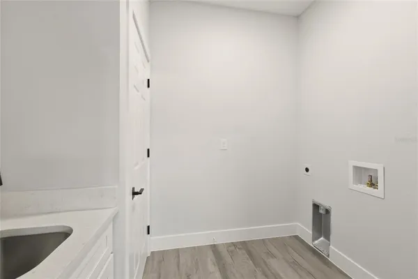 a bathroom with a sink and toilet