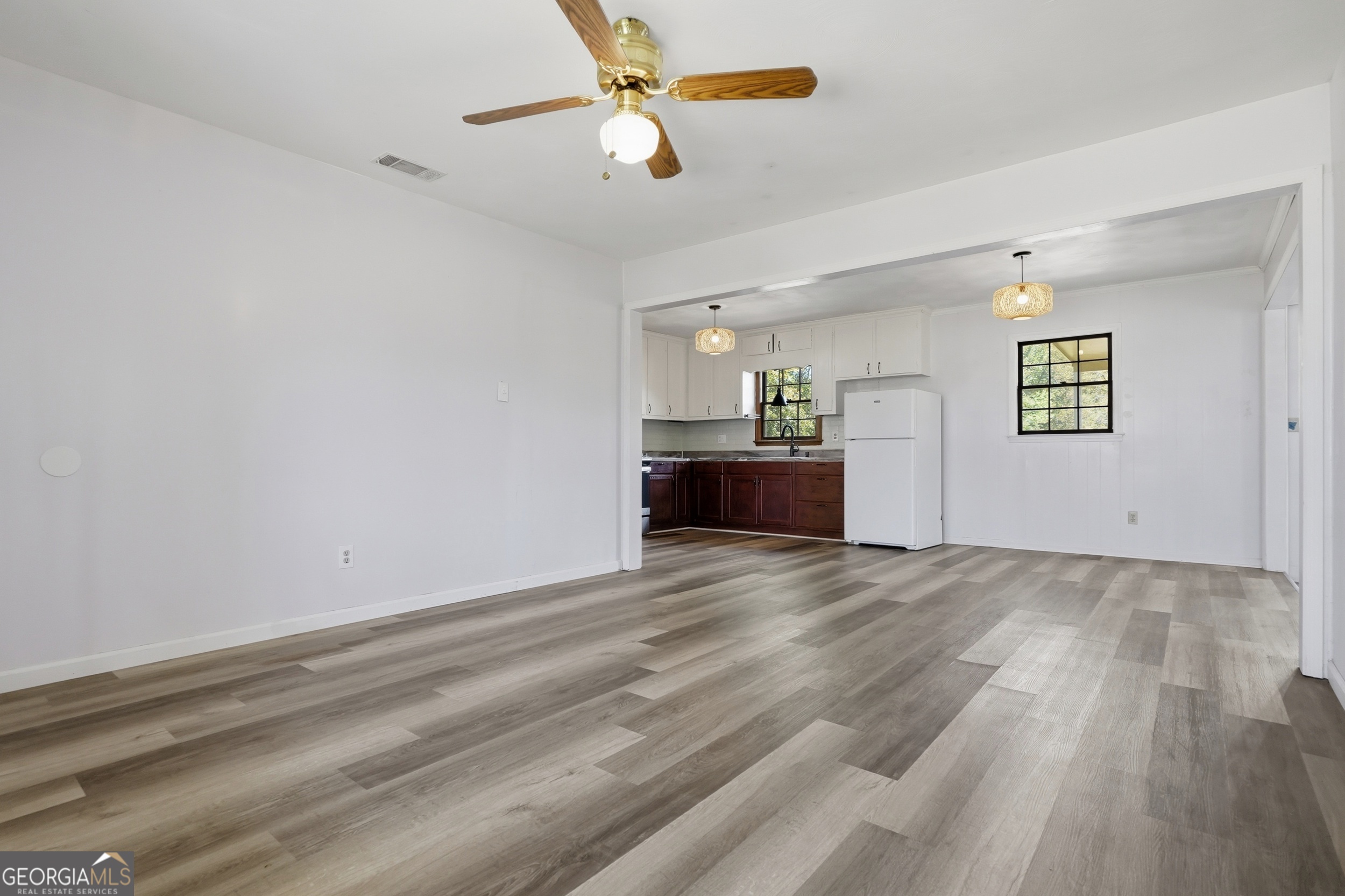 3710 Coakley Avenue Albany, GA 31721 - Photo 15 of 47 wooden floor in an empty room with a window