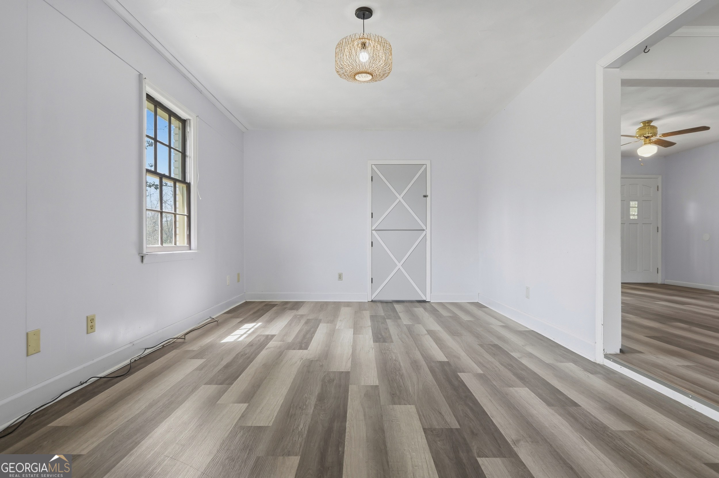 3710 Coakley Avenue Albany, GA 31721 - Photo 23 of 47 wooden floor in an empty room with a window