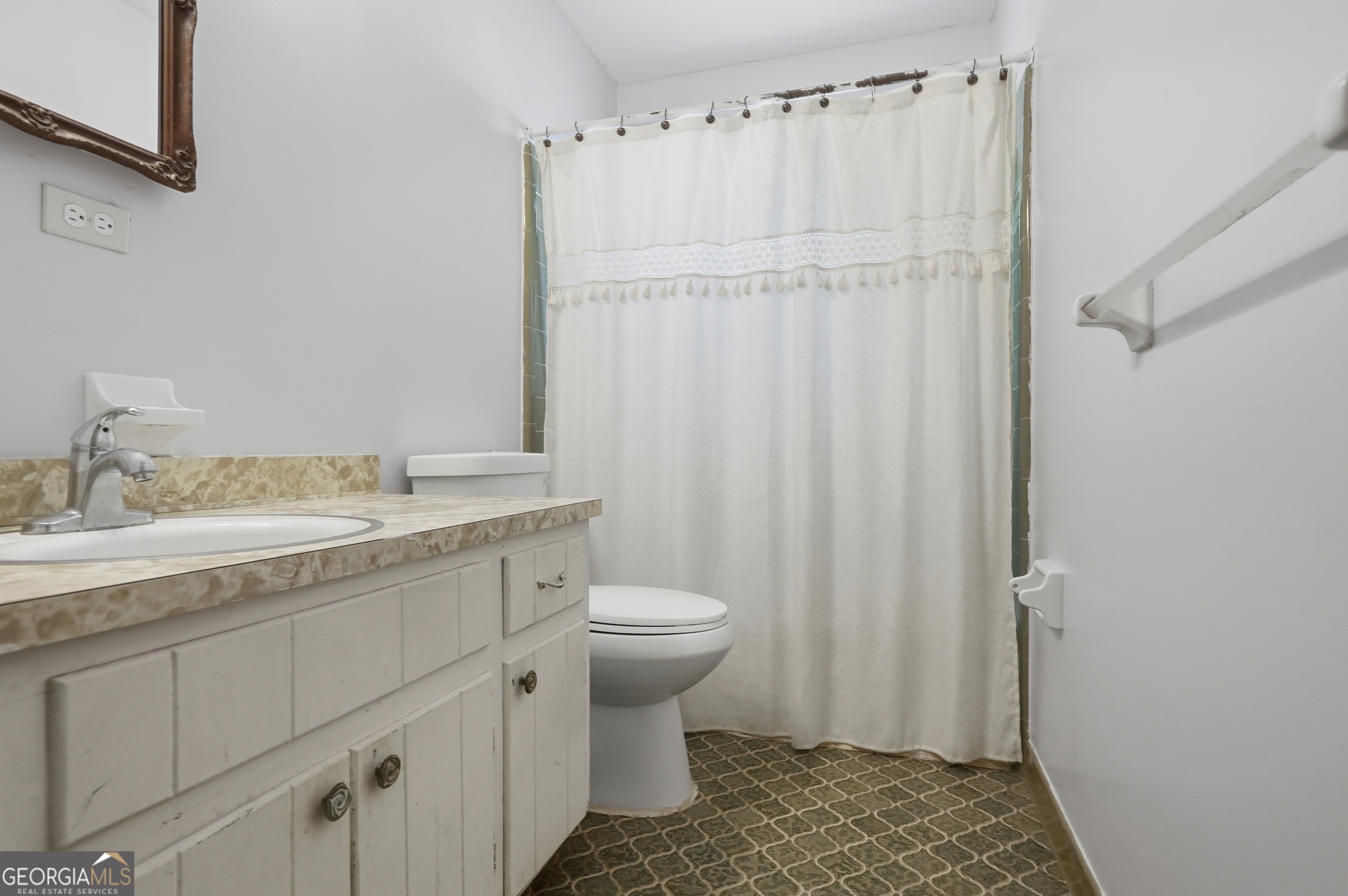 3710 Coakley Avenue Albany, GA 31721 - Photo 30 of 47 a bathroom with a granite countertop sink toilet and shower