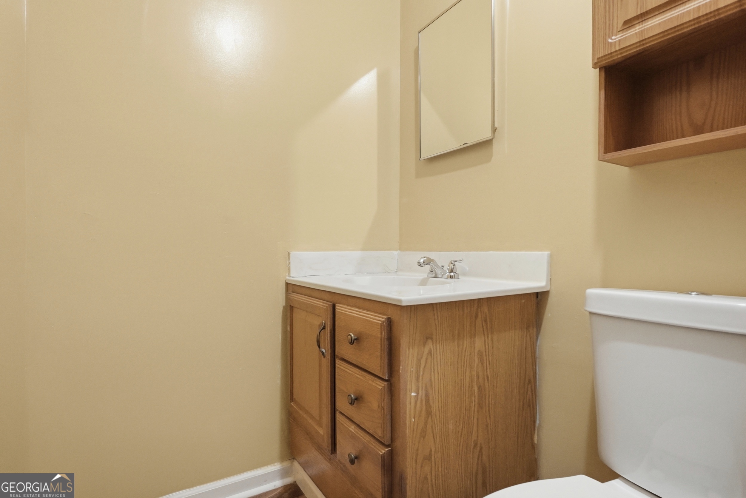 3710 Coakley Avenue Albany, GA 31721 - Photo 34 of 47 a bathroom with a sink a toilet and vanity