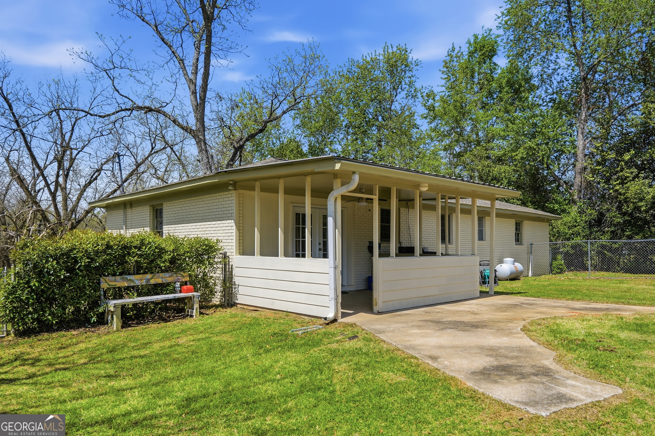 3710 Coakley Avenue Albany, GA 31721 - Photo 38 of 47 a front view of a house with a garden