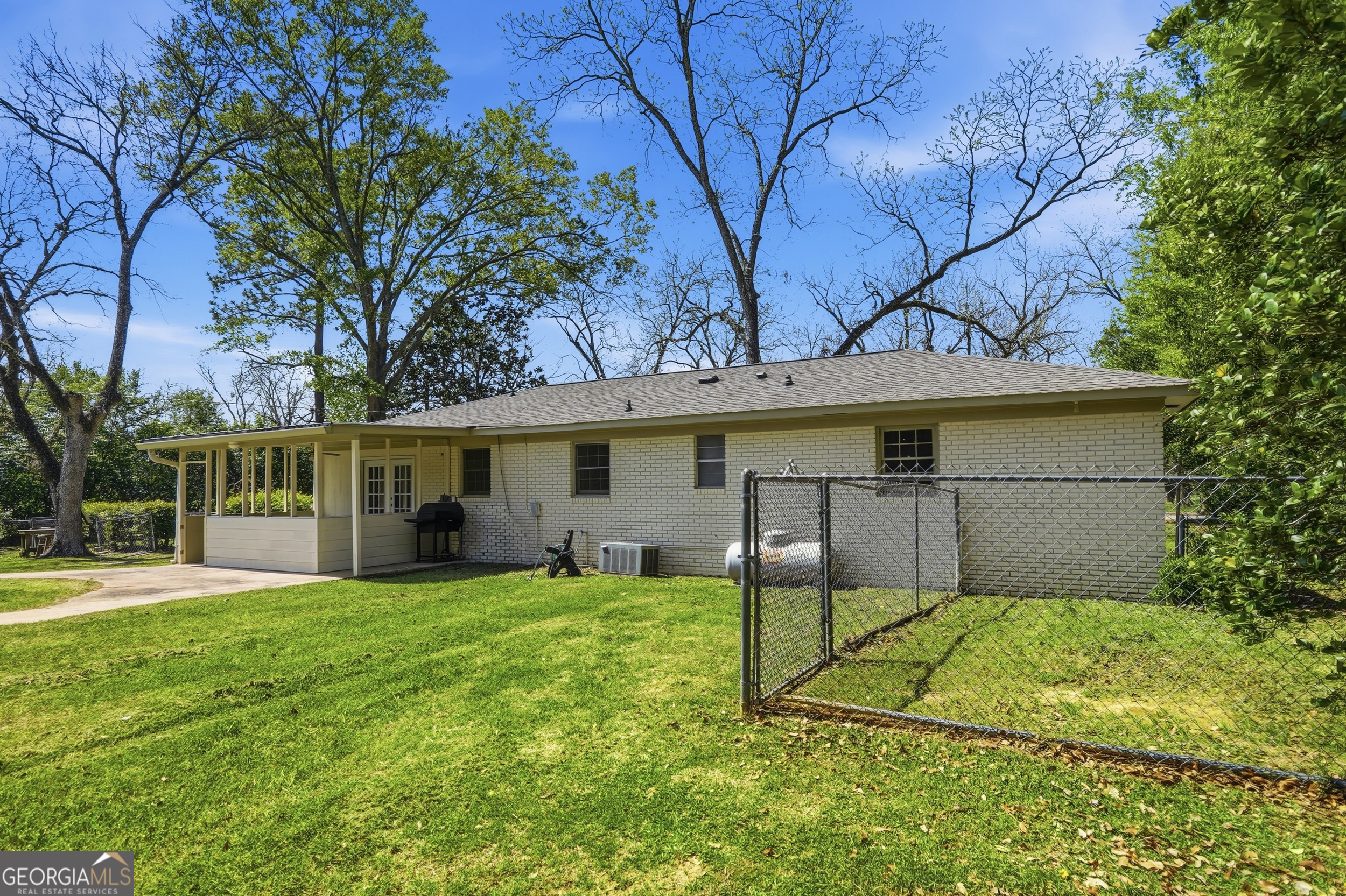 3710 Coakley Avenue Albany, GA 31721 - Photo 40 of 47 a view of a house with a yard and a large tree