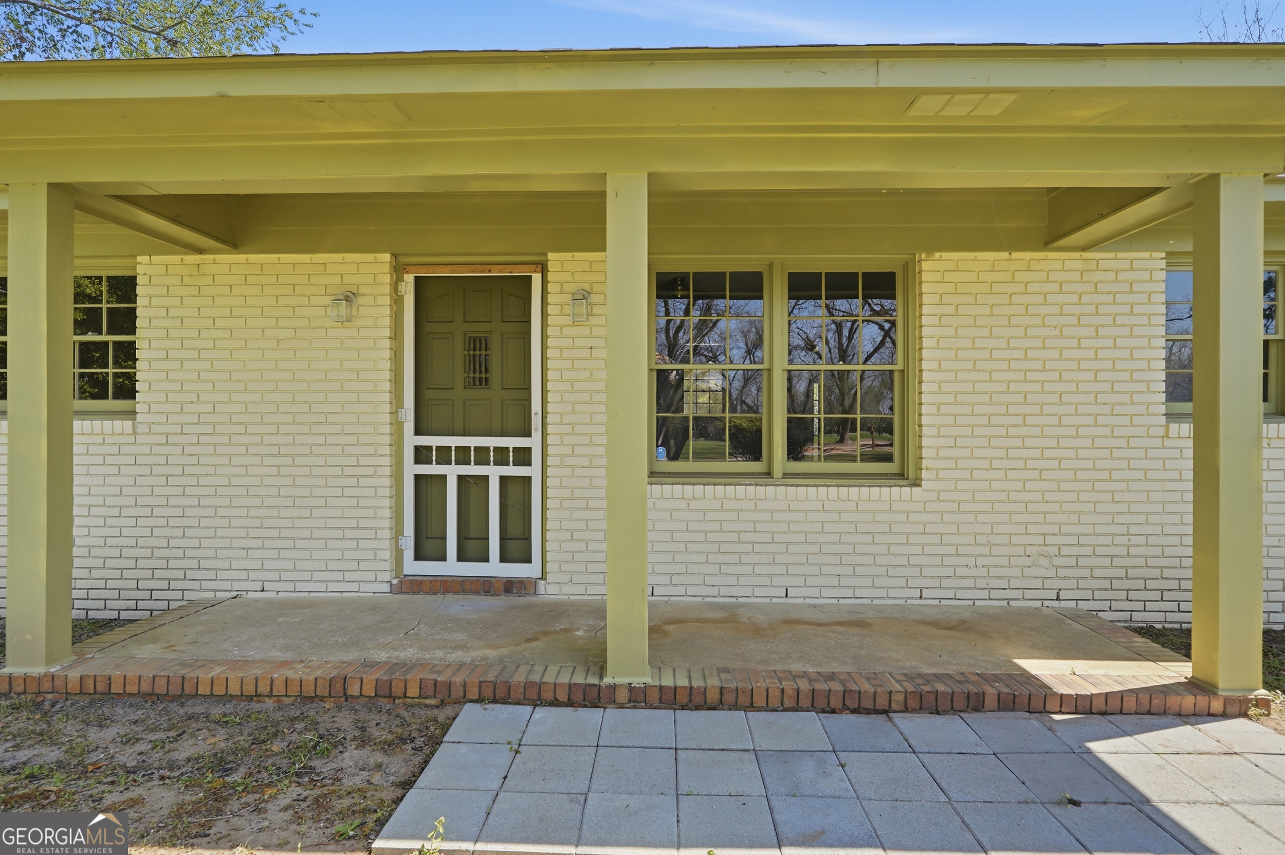 3710 Coakley Avenue Albany, GA 31721 - Photo 10 of 47 a view of a brick house with a large window