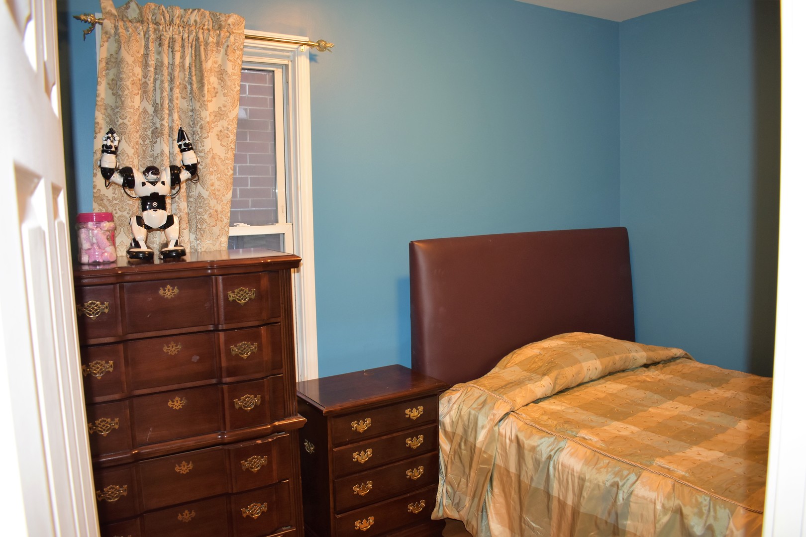 3539 North Pulaski Road Chicago, IL 60641 - Photo 17 of 23 a bedroom with a bed and a window