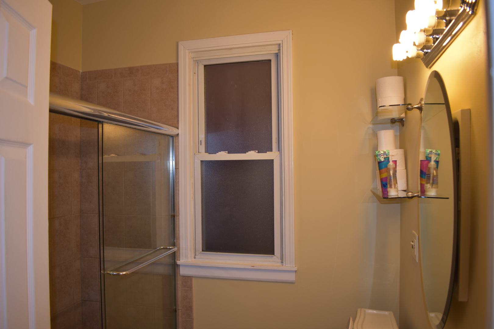 3539 North Pulaski Road Chicago, IL 60641 - Photo 21 of 23 a bathroom with a mirror