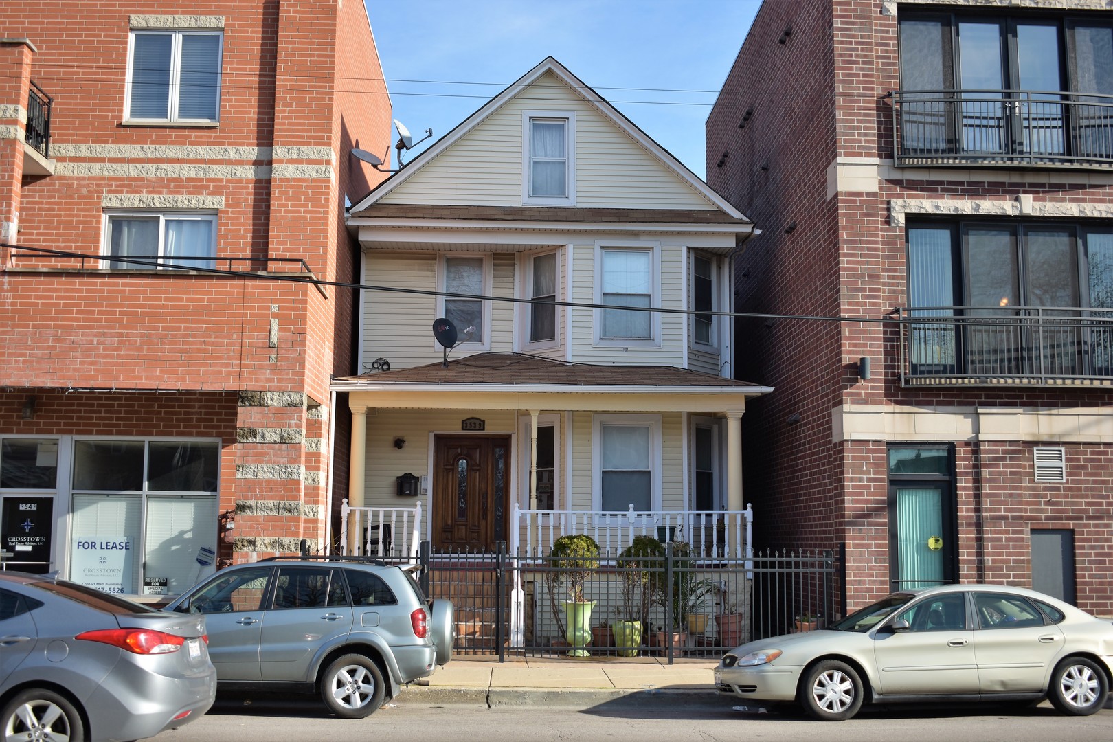 3539 North Pulaski Road Chicago, IL 60641 - Photo 23 of 23 a front view of a house with parking space