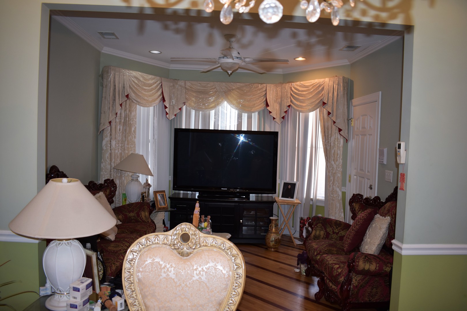 3539 North Pulaski Road Chicago, IL 60641 - Photo 7 of 23 a living room with furniture and a flat screen tv