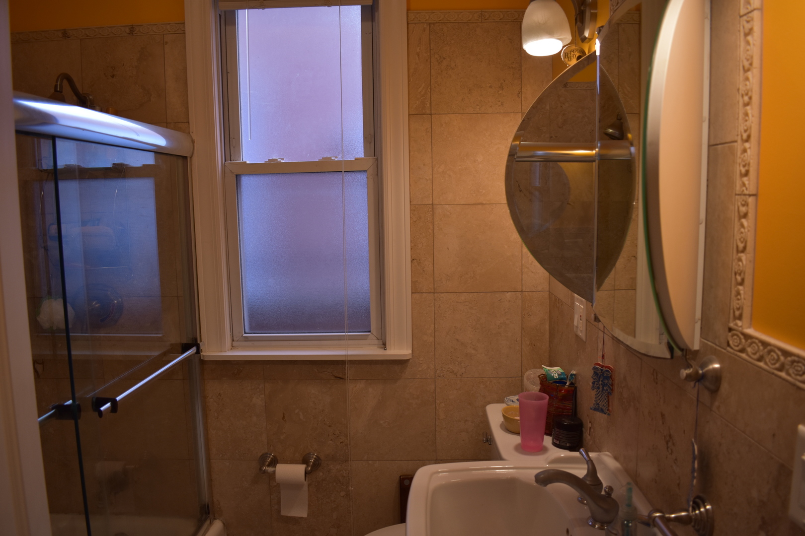 3539 North Pulaski Road Chicago, IL 60641 - Photo 9 of 23 a bathroom with a sink mirror and toilet