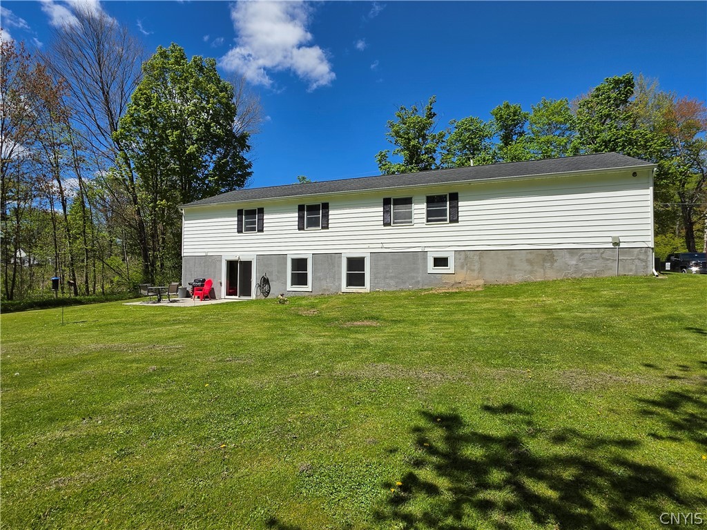 147 Gildner Road Central Square, NY 13036 - Photo 3 of 48 Rear of home with patio and sliding door to lower level