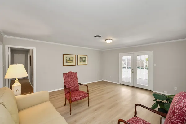 a living room with furniture and a window