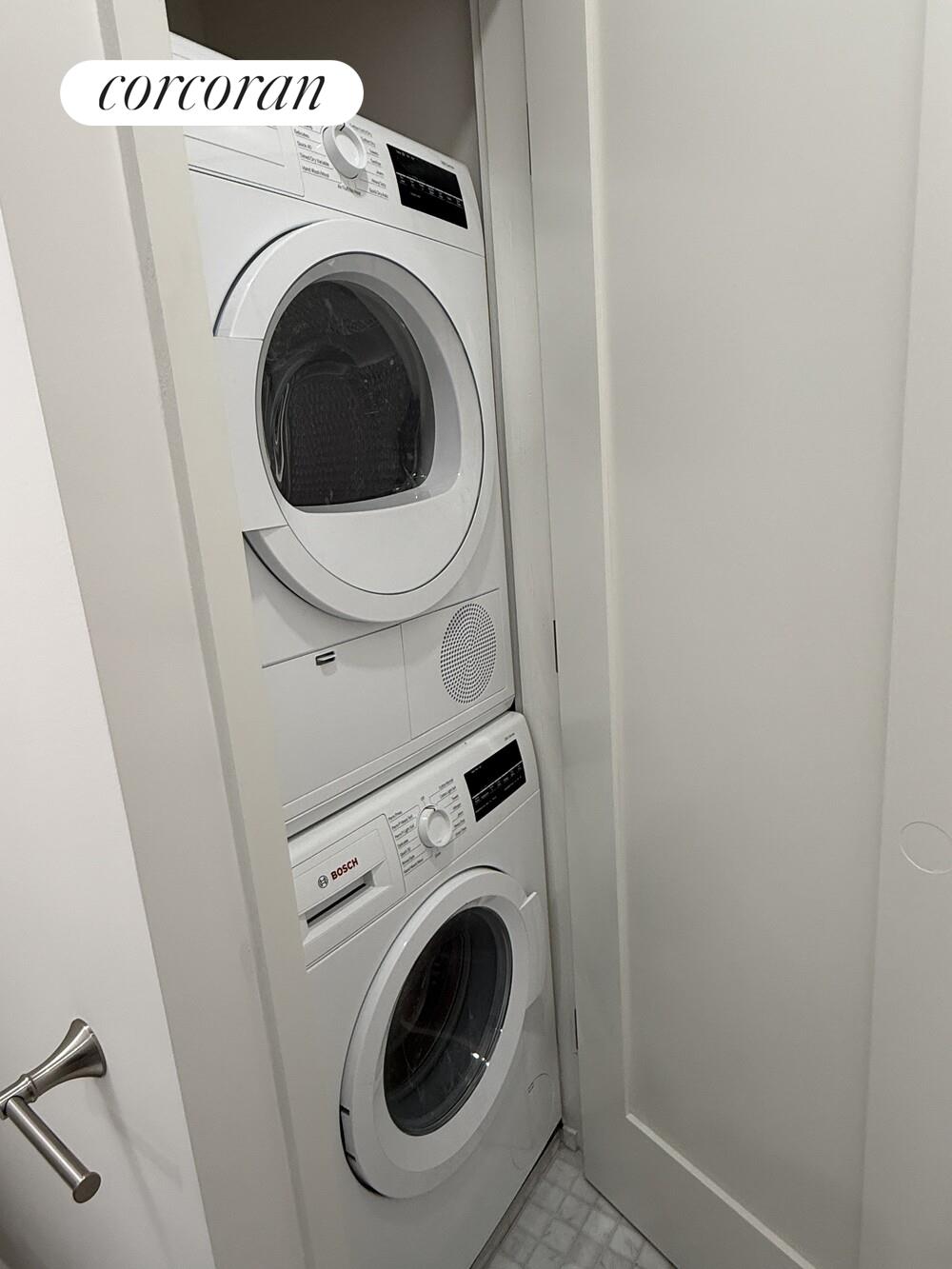 9511 Shore Road, Unit 609 Brooklyn, NY 11209 - Photo 13 of 16 a utility room with dryer and washer