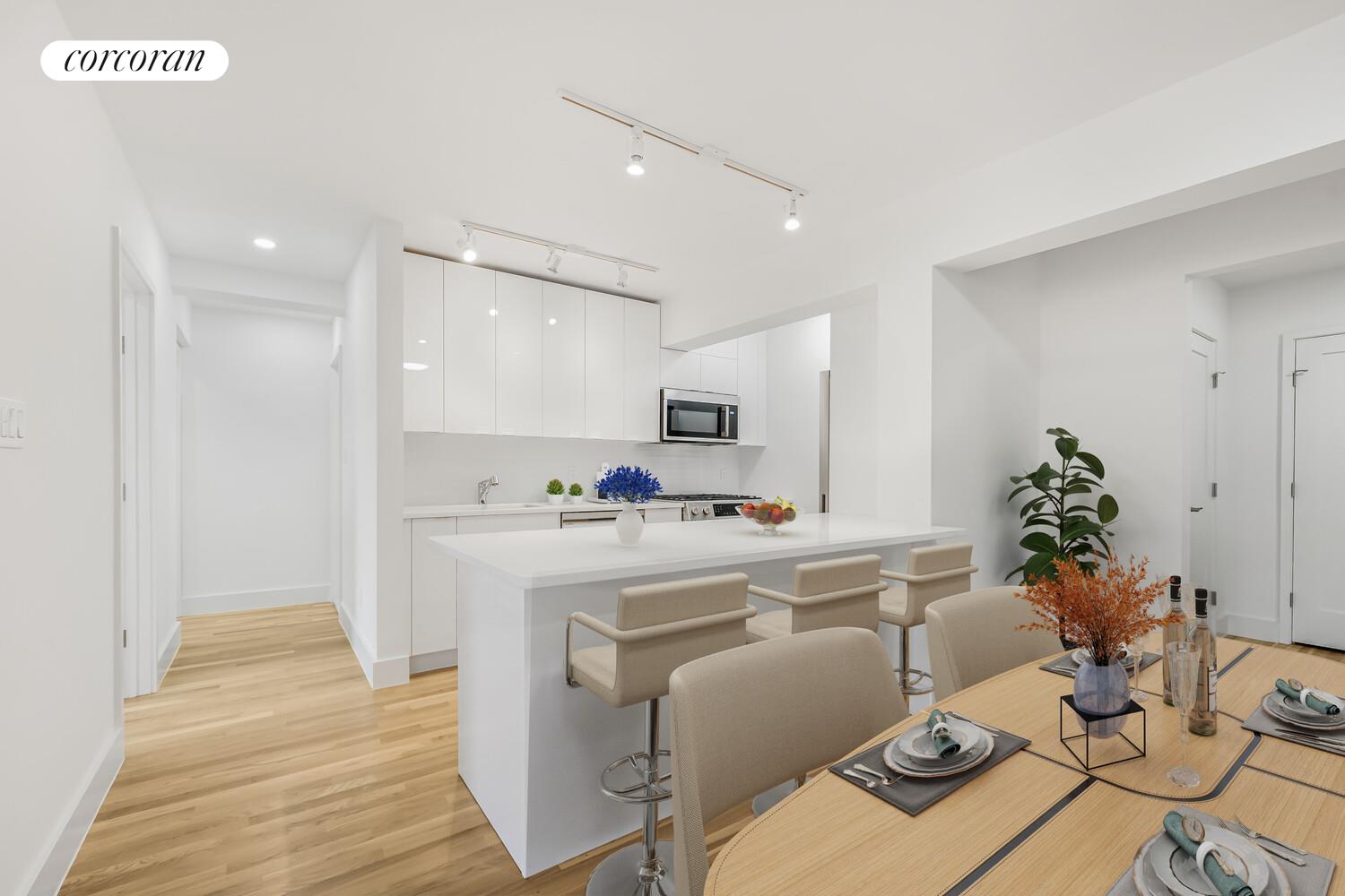 9511 Shore Road, Unit 609 Brooklyn, NY 11209 - Photo 4 of 16 a view of a dining room with furniture window and wooden floor