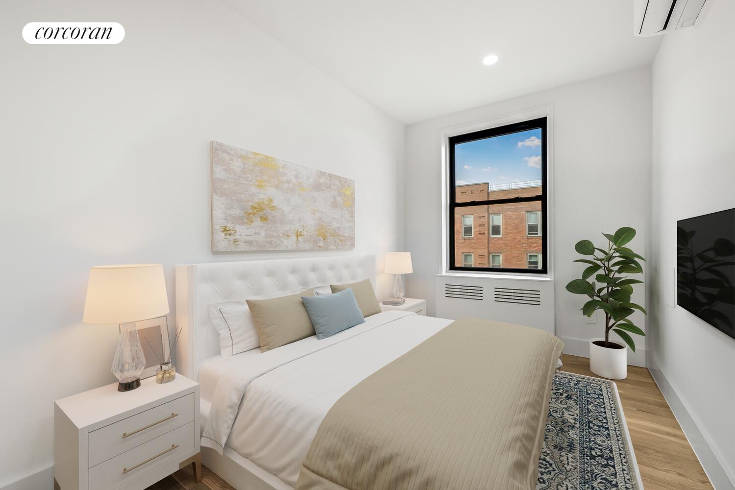 9511 Shore Road, Unit 609 Brooklyn, NY 11209 - Photo 9 of 16 a bedroom with a bed and a flat screen tv