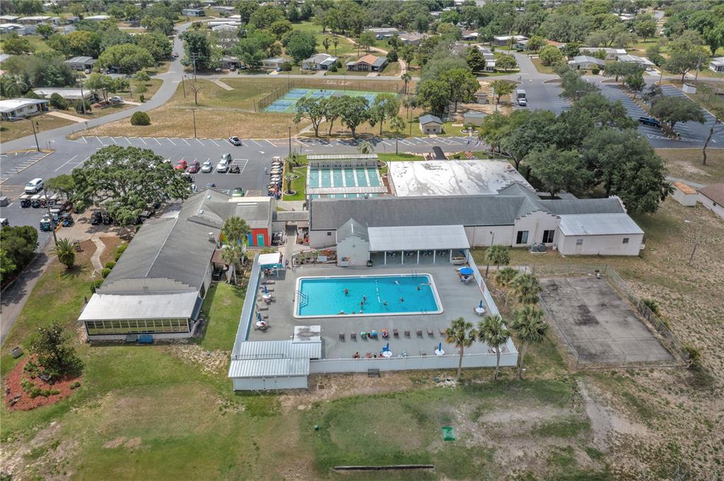 8242 Fiesta Street Brooksville, FL 34613 - Photo 25 of 31 an aerial view of a house with a garden