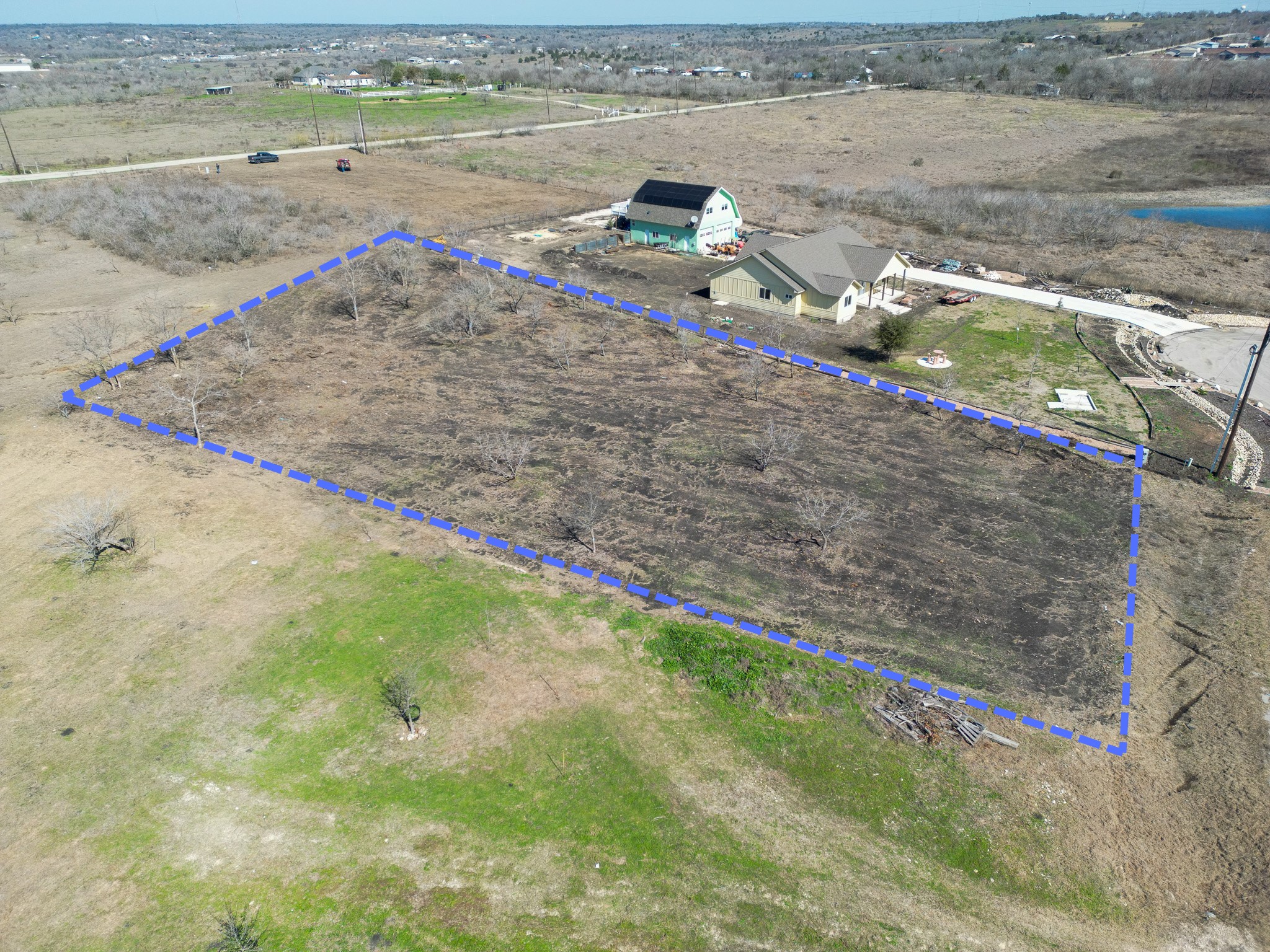 433 East Ridge Lane Kyle, TX 78640 - Photo 3 of 3 Overview of rural landscape with property parcel outlined