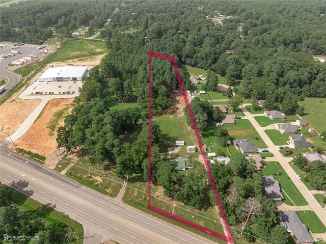 a view of a yard with an outdoor space