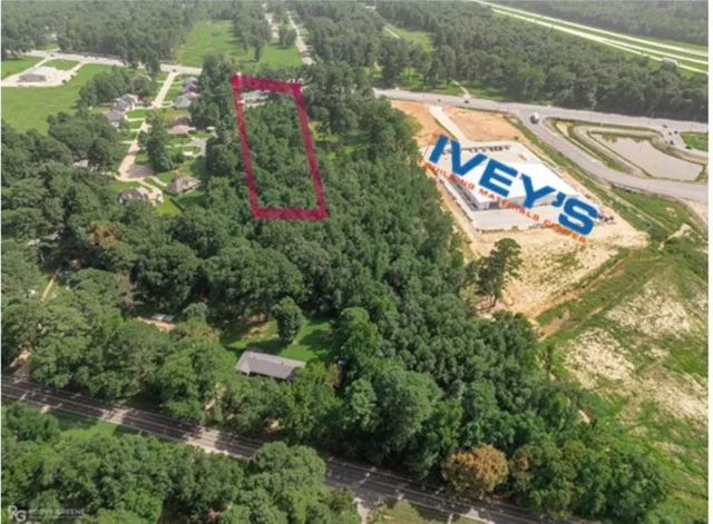 a view of a yard with an outdoor space