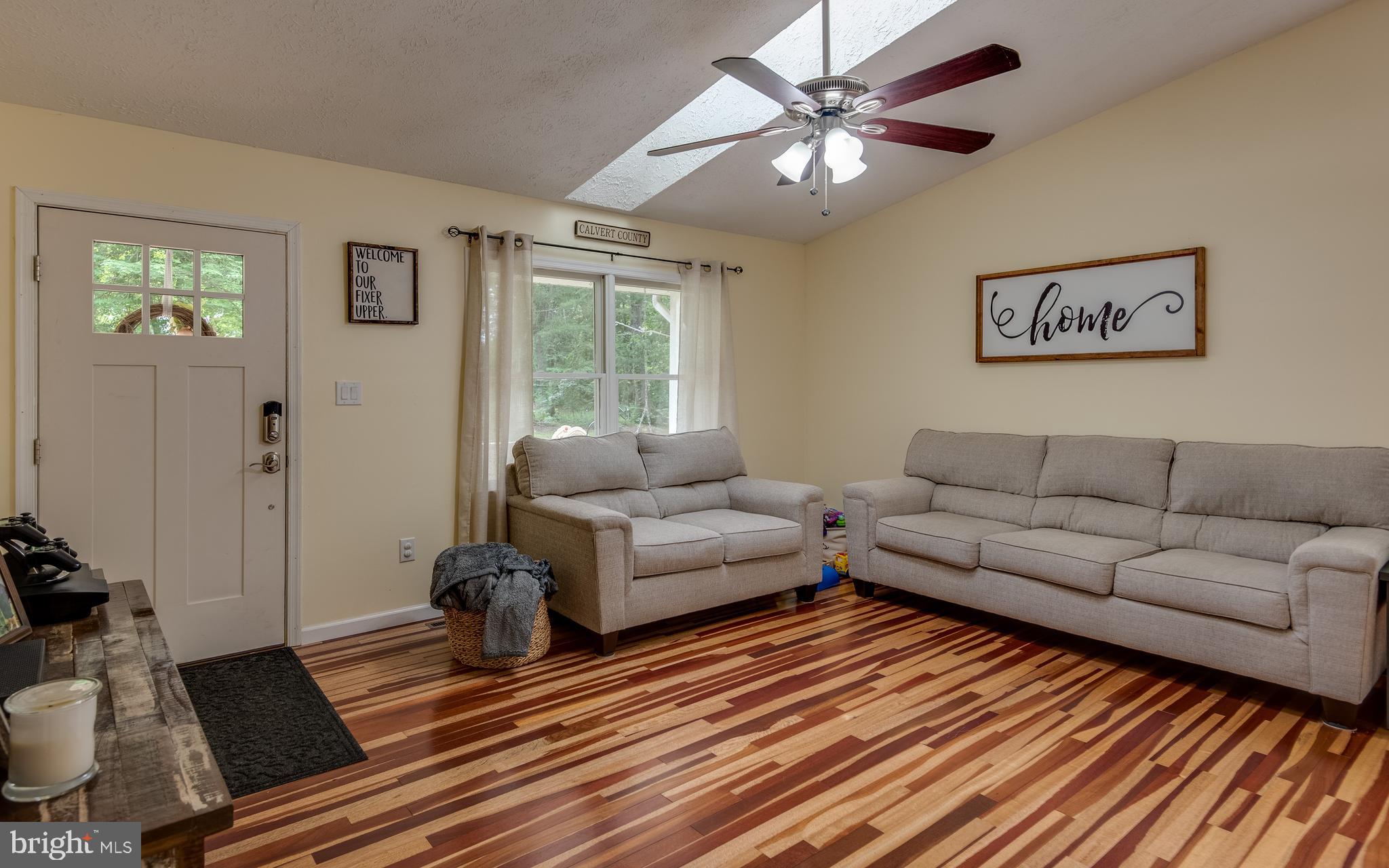 12430 Ridge Road Lusby, MD 20657 - Photo 14 of 36 a living room with furniture and a window