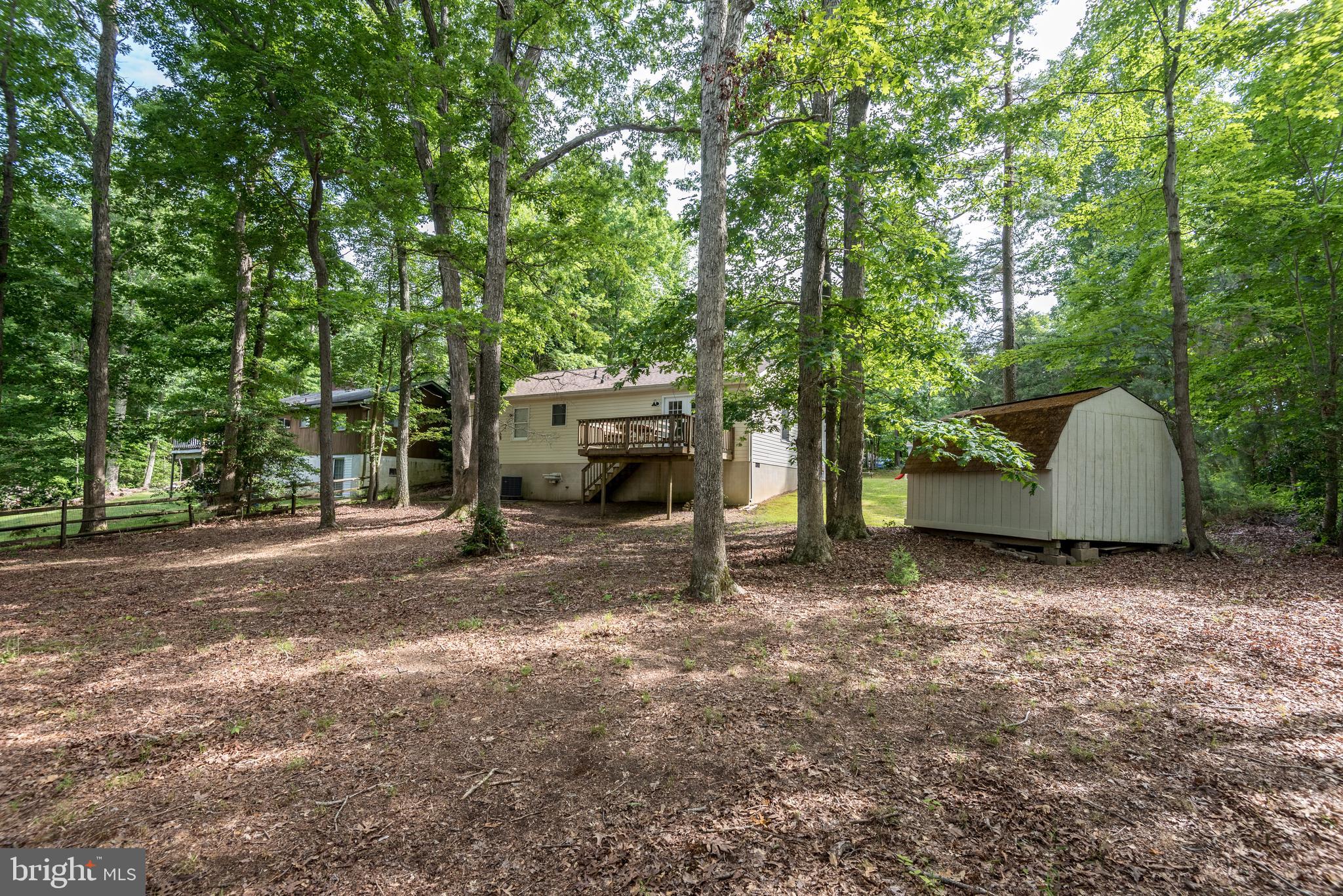 12430 Ridge Road Lusby, MD 20657 - Photo 31 of 36 a view of a house with backyard