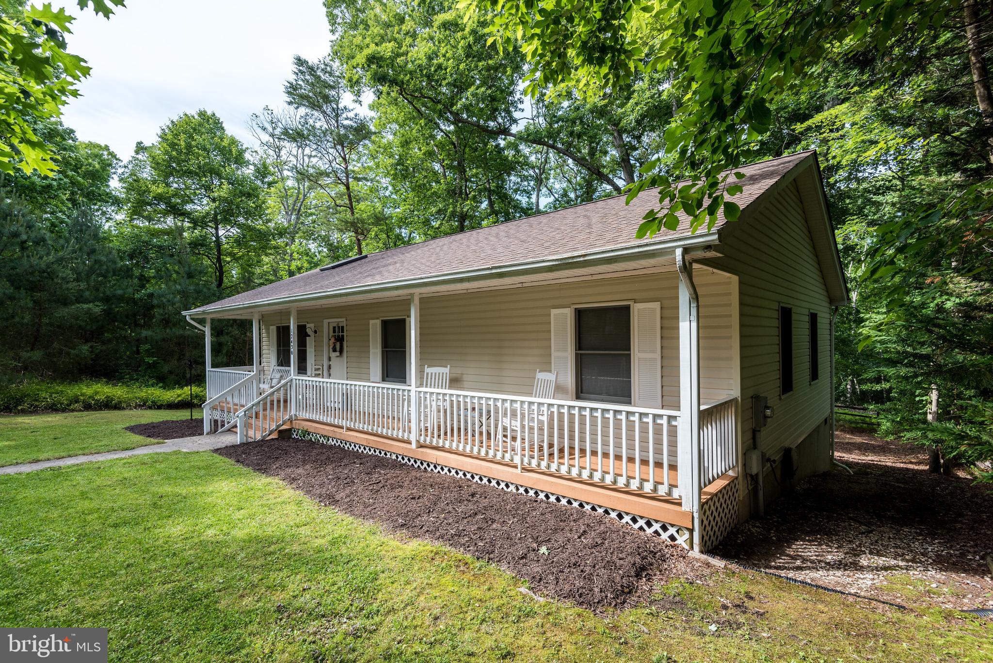 12430 Ridge Road Lusby, MD 20657 - Photo 35 of 36 a view of a house with a yard