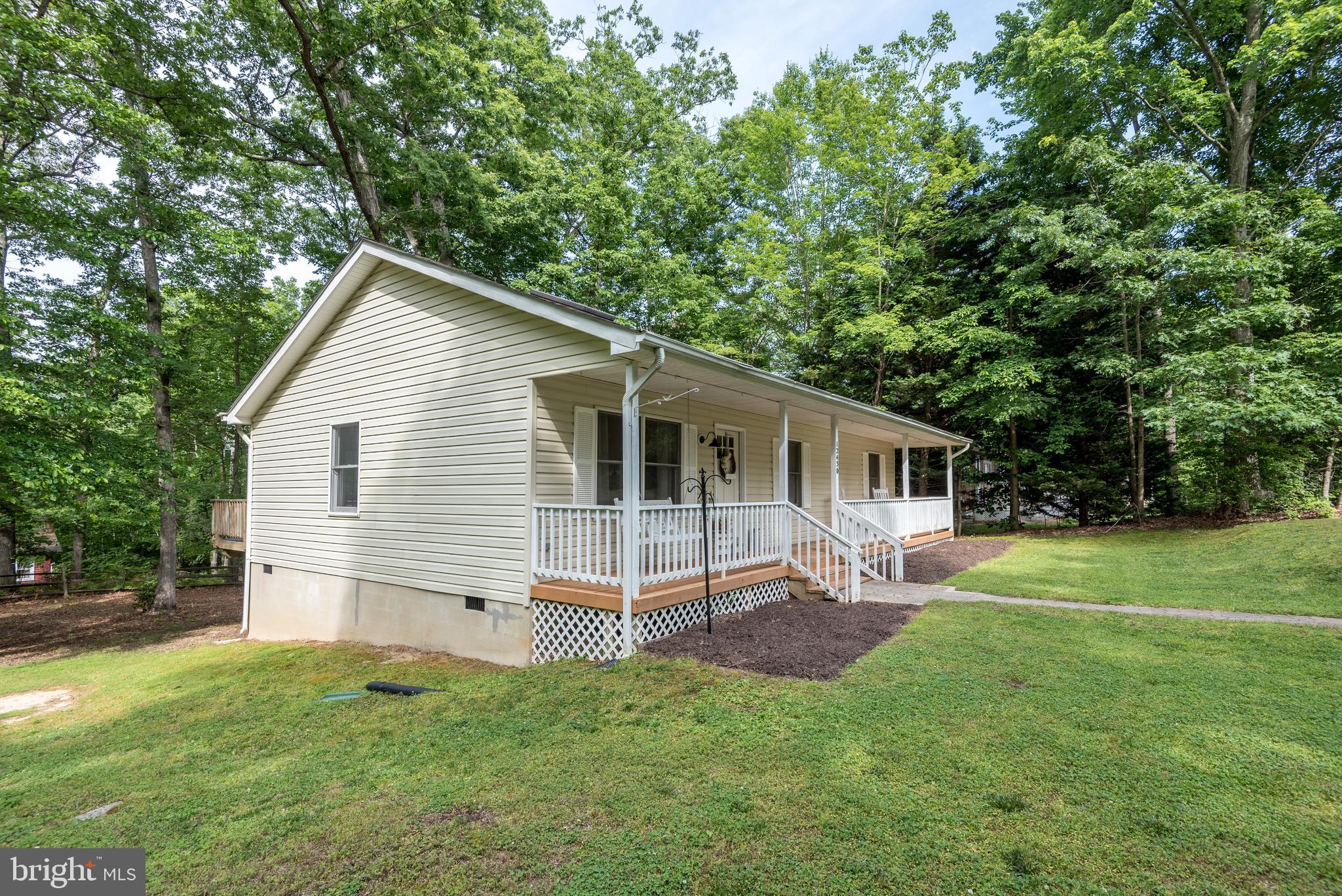 12430 Ridge Road Lusby, MD 20657 - Photo 36 of 36 a view of a house with backyard