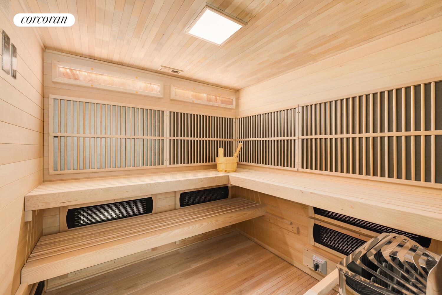 420 East 75th Street, Unit 4 Manhattan, NY 10021 - Photo 19 of 22 a bathroom with a bathtub and wooden floor