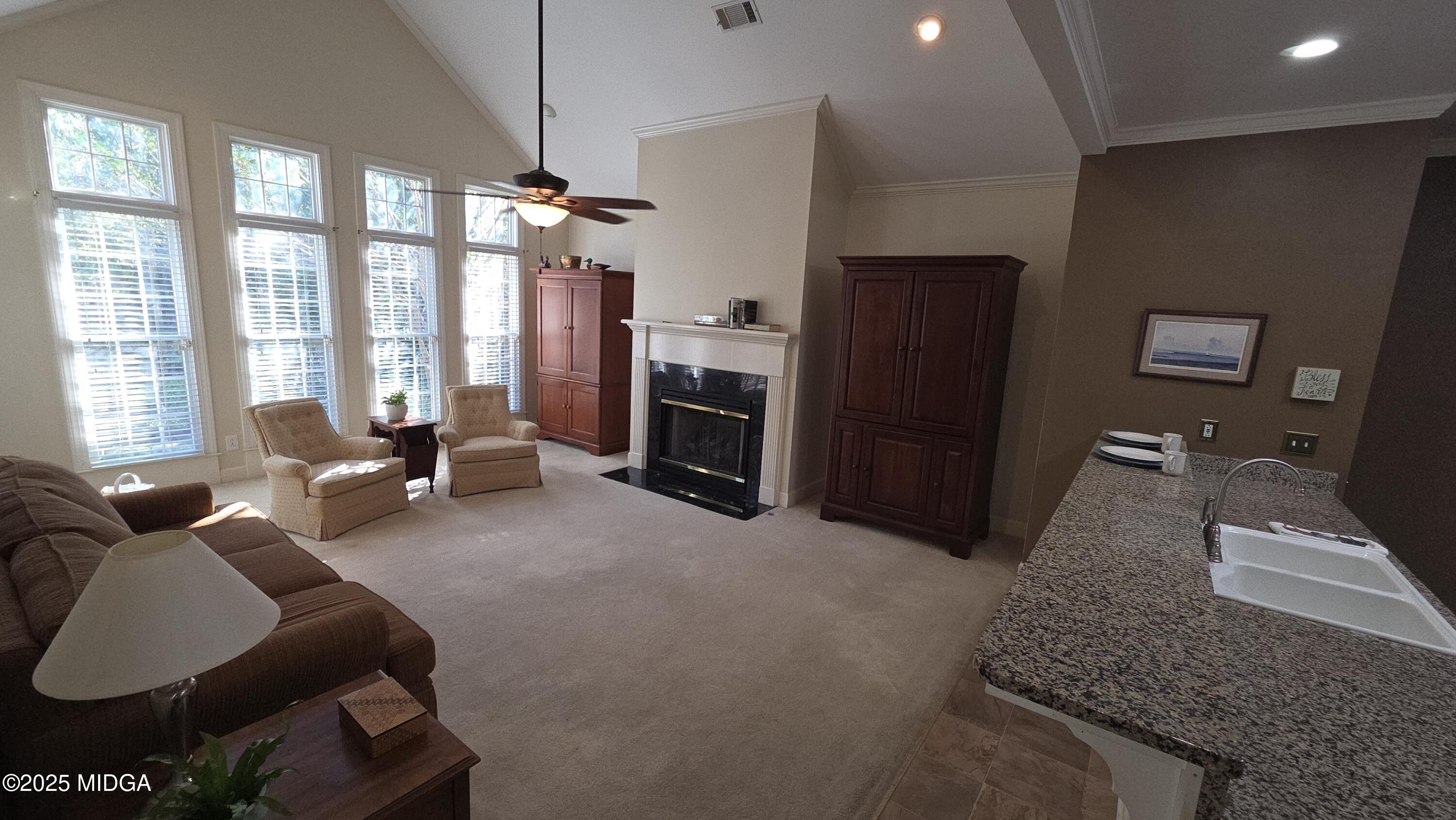 107 North Wellington Macon, GA 31210 - Photo 12 of 23 a living room with furniture and a fireplace
