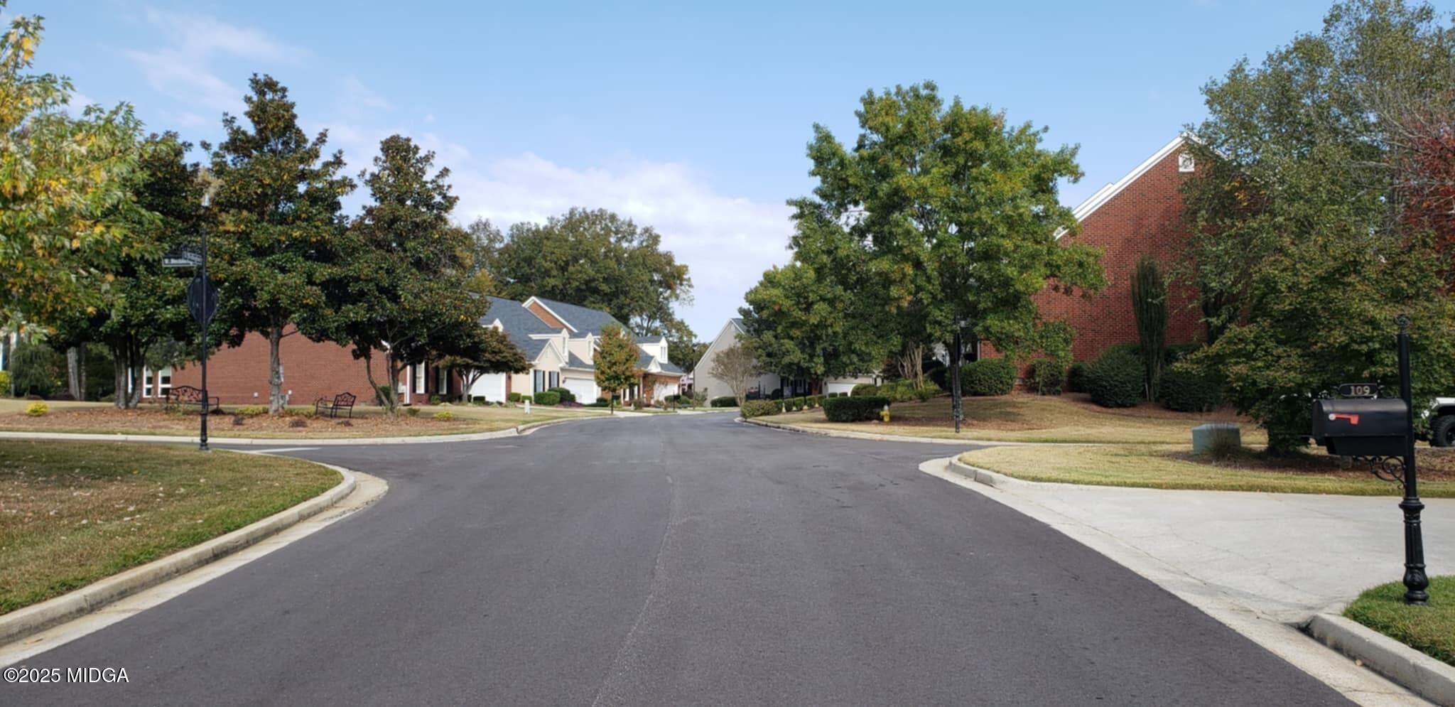 107 North Wellington Macon, GA 31210 - Photo 2 of 23 a view of a street with houses on both side