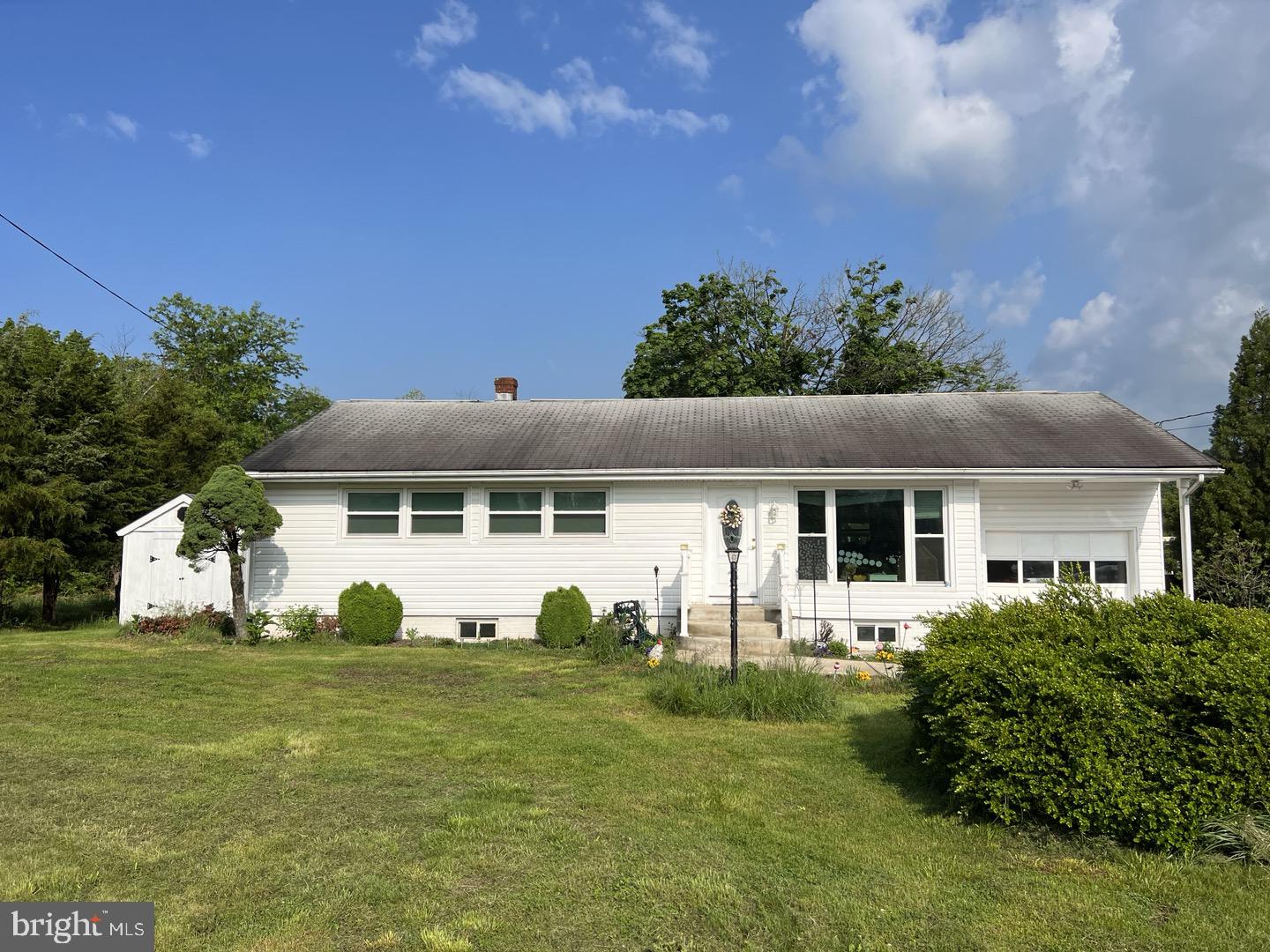 7108 Ordway Road Centreville, VA 20121 - Photo 2 of 6 a front view of a house with a yard