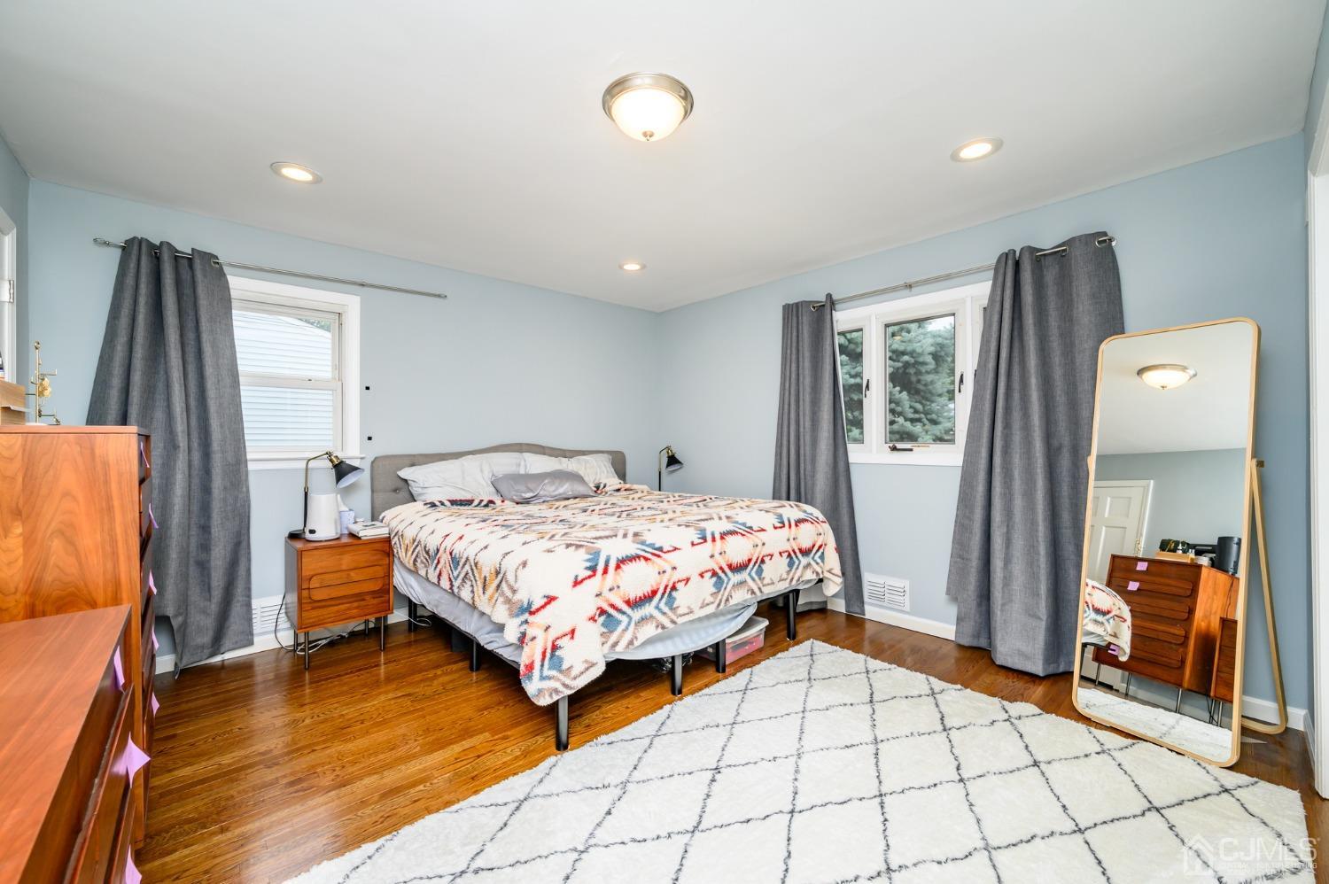 10 Ferris Road Edison, NJ 08817 - Photo 14 of 32 a bedroom with a bed and a walk in closet