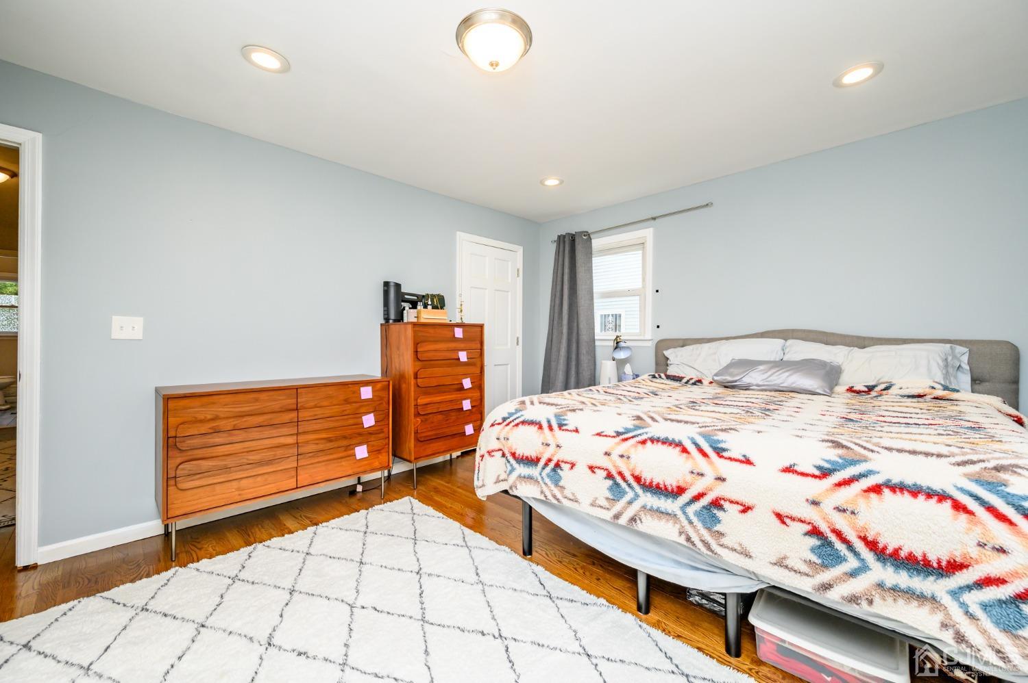 10 Ferris Road Edison, NJ 08817 - Photo 15 of 32 a bedroom with double bed and a window
