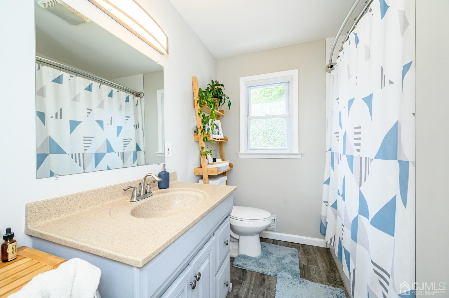 10 Ferris Road Edison, NJ 08817 - Photo 19 of 32 a bathroom with a sink toilet and shower
