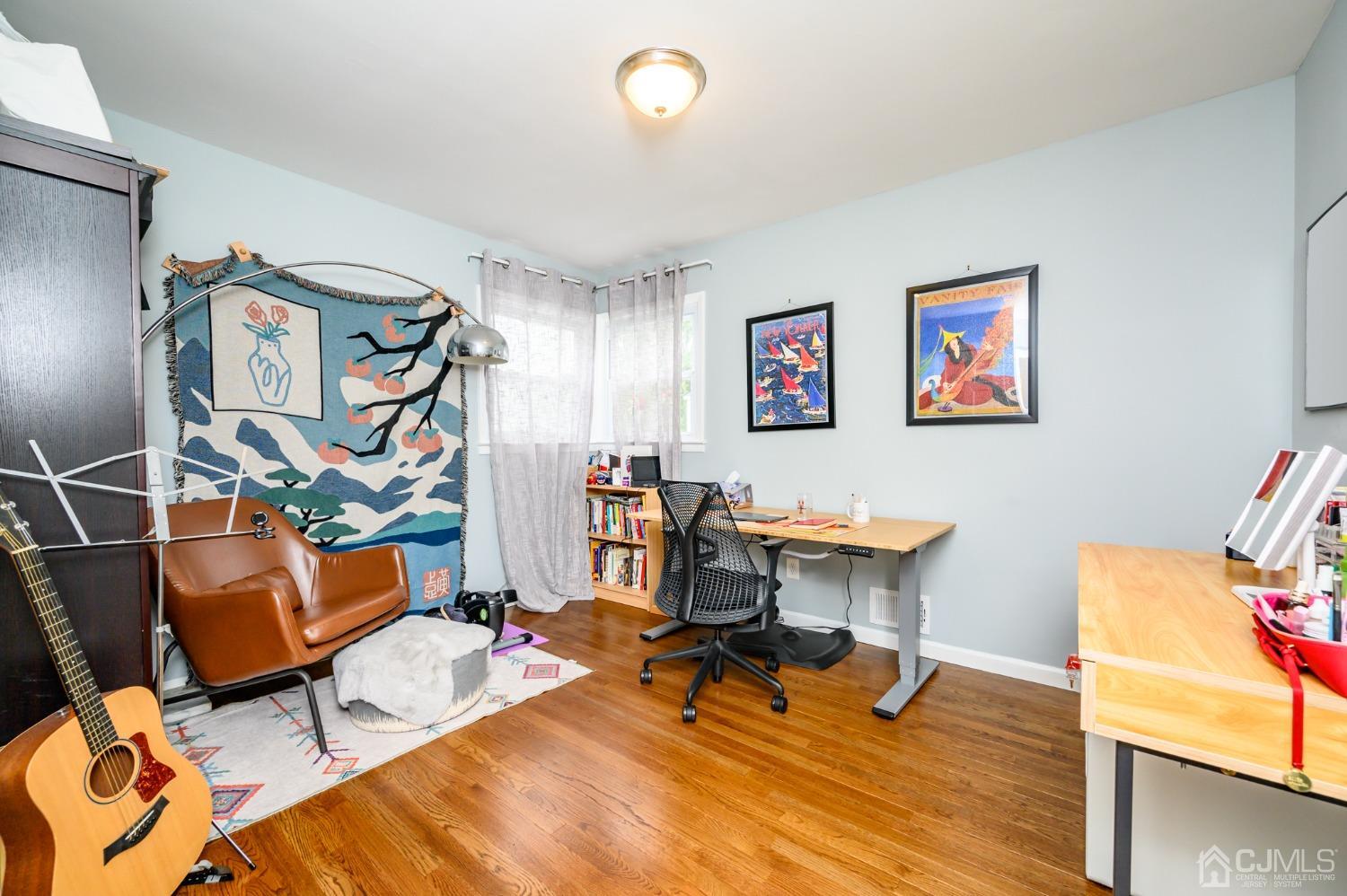 10 Ferris Road Edison, NJ 08817 - Photo 20 of 32 a view of a workspace with furniture and a workspace