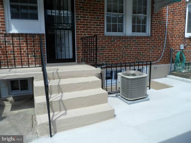 1517 Tunlaw Road Baltimore, MD 21218 - Photo 19 of 30 A/C Unit & Patio