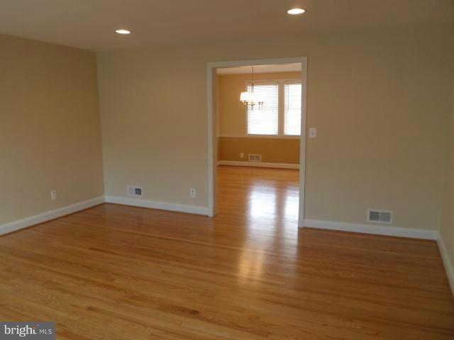 1517 Tunlaw Road Baltimore, MD 21218 - Photo 21 of 30 Living Room/Dining Room