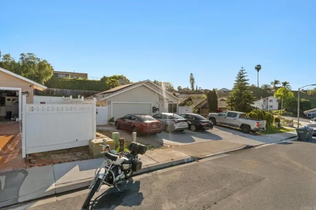 an aerial view of a house with a garden