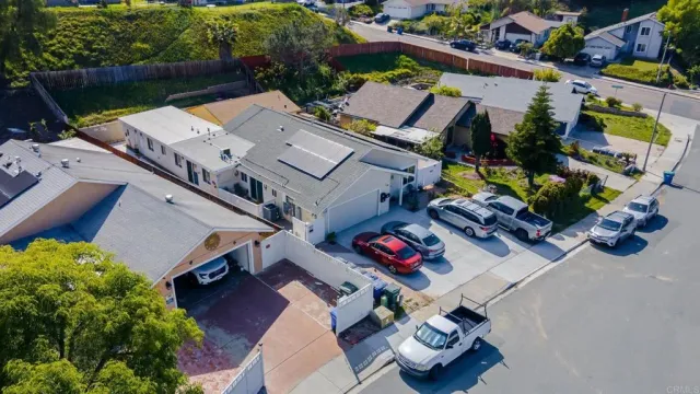 an aerial view of a house with a garden