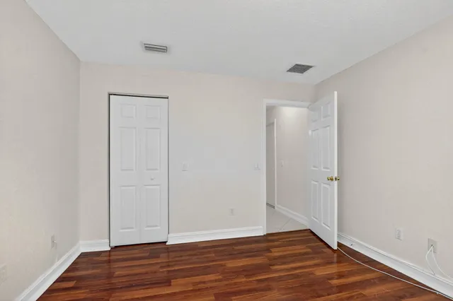 a view of a livingroom with wooden floor