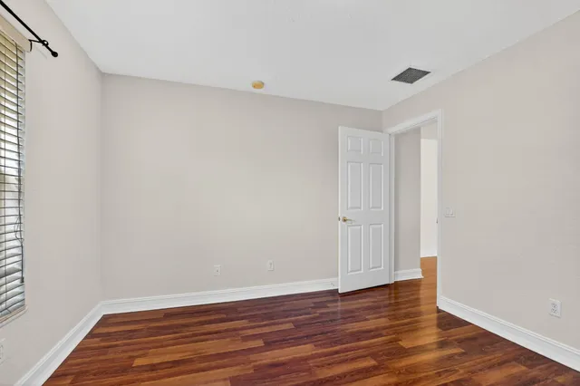 a view of a backyard with sitting area