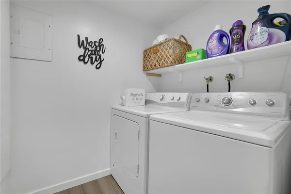 a utility room with dryer and washer