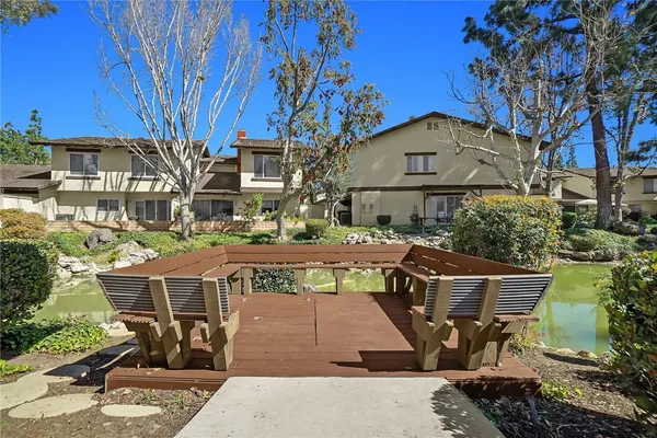 a view of swimming pool with outdoor seating