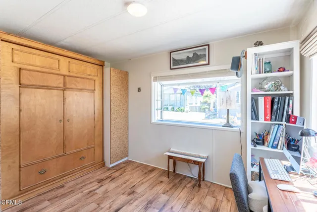 a room with furniture and a flat screen tv