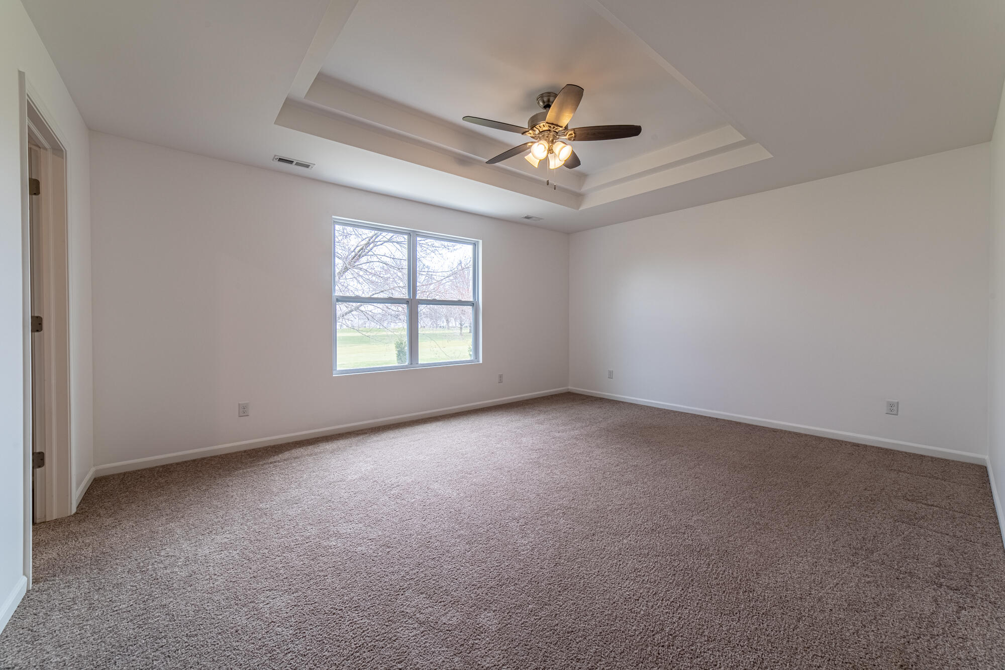 13131 Rutledge Place Crown Point, IN 46307 - Photo 15 of 25 an empty room with windows and fan