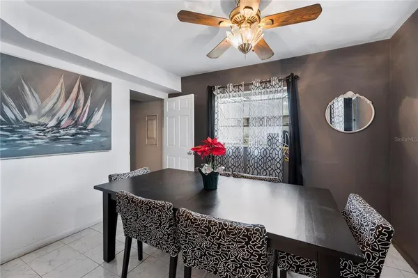a view of a livingroom with furniture and chandelier